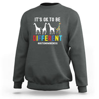 Dark heather autism sweatshirt with “It’s ok to be different” giraffe graphic on front