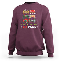 Maroon crewneck sweatshirt with festive gaming graphic and CHECK OUT MY SIX PACK text