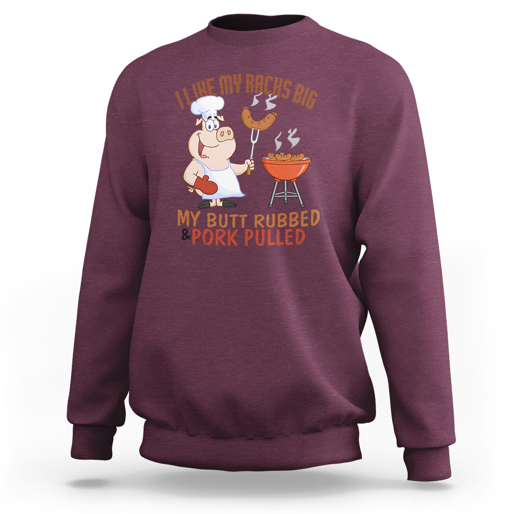 Maroon BBQ sweatshirt featuring cartoon chef grilling graphic and rib/pork text