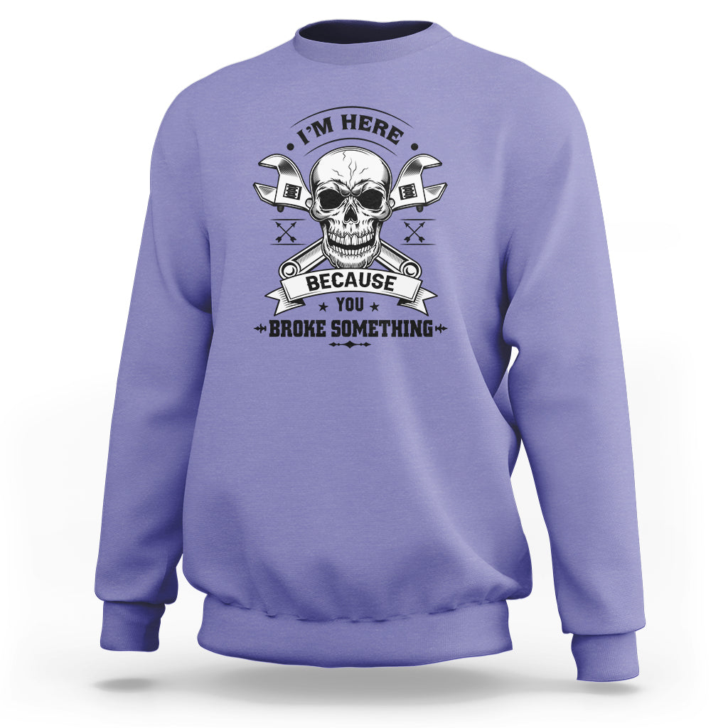 Violet crewneck sweatshirt with skull mechanic graphic, banner text, and crossed tools