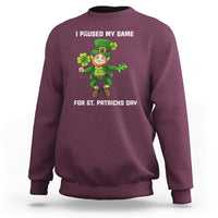 Maroon sweatshirt with game controller St. Patrick's Day graphic and 'I PAUSED MY GAME' text