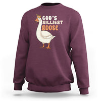 Maroon crewneck sweatshirt with 'God's Silliest Goose' goose graphic on the front