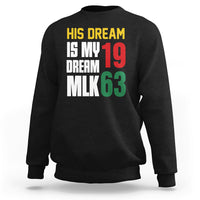 Black crewneck sweatshirt with colorful text graphic: "HIS DREAM IS MY DREAM 19 MLK63"