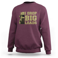 Maroon crewneck sweatshirt with 'I DROP BIG LOADS' truck graphic on front.
