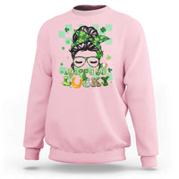 Light pink crewneck sweatshirt with green shamrock hair girl graphic and “Happy Go Luck” text.