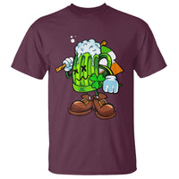 Men's maroon graphic T-shirt with cartoon green beer mug, clover, boots and foam