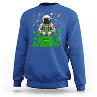 Royal blue crewneck sweatshirt with astronaut leprechaun space-themed graphic on front