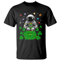 Black astronaut St. Patrick’s graphic T-shirt with leprechaun clover print