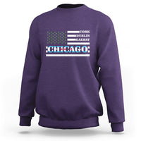 Purple crewneck sweatshirt with “CHICAGO” graphic and Irish-city text above
