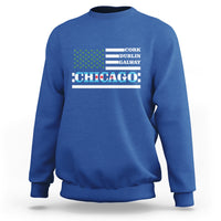 Royal blue crewneck sweatshirt with “CHICAGO” graphic and Irish-city text above