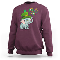 Maroon crewneck sweatshirt with cute elephant St. Patrick’s graphic and shamrock confetti