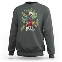Dark heather crewneck sweatshirt with skull barista graphic and “COFFEE DEALER” text