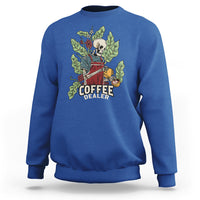 Royal blue crewneck sweatshirt with skull barista graphic and “COFFEE DEALER” text