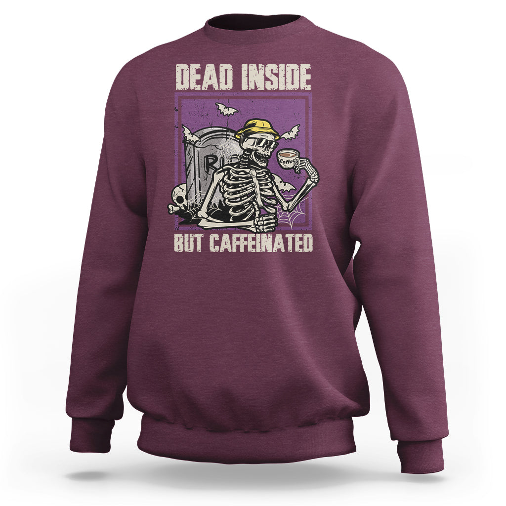 Maroon Halloween skeleton sweatshirt with back “Dead Inside, But Caffeinated” graphic.