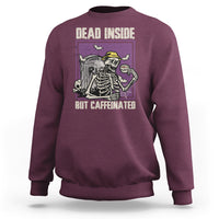 Maroon Halloween skeleton sweatshirt with back “Dead Inside, But Caffeinated” graphic.