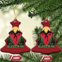 Red Christmas tree-shaped Mothman Christmas ornament, front and back, “Believes in You”