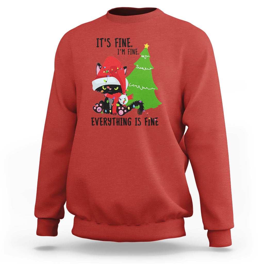 Red Christmas sweatshirt with cat-and-tree graphic and “It’s fine… Everything is fine” text