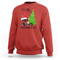 Red Christmas sweatshirt with cat-and-tree graphic and “It’s fine… Everything is fine” text