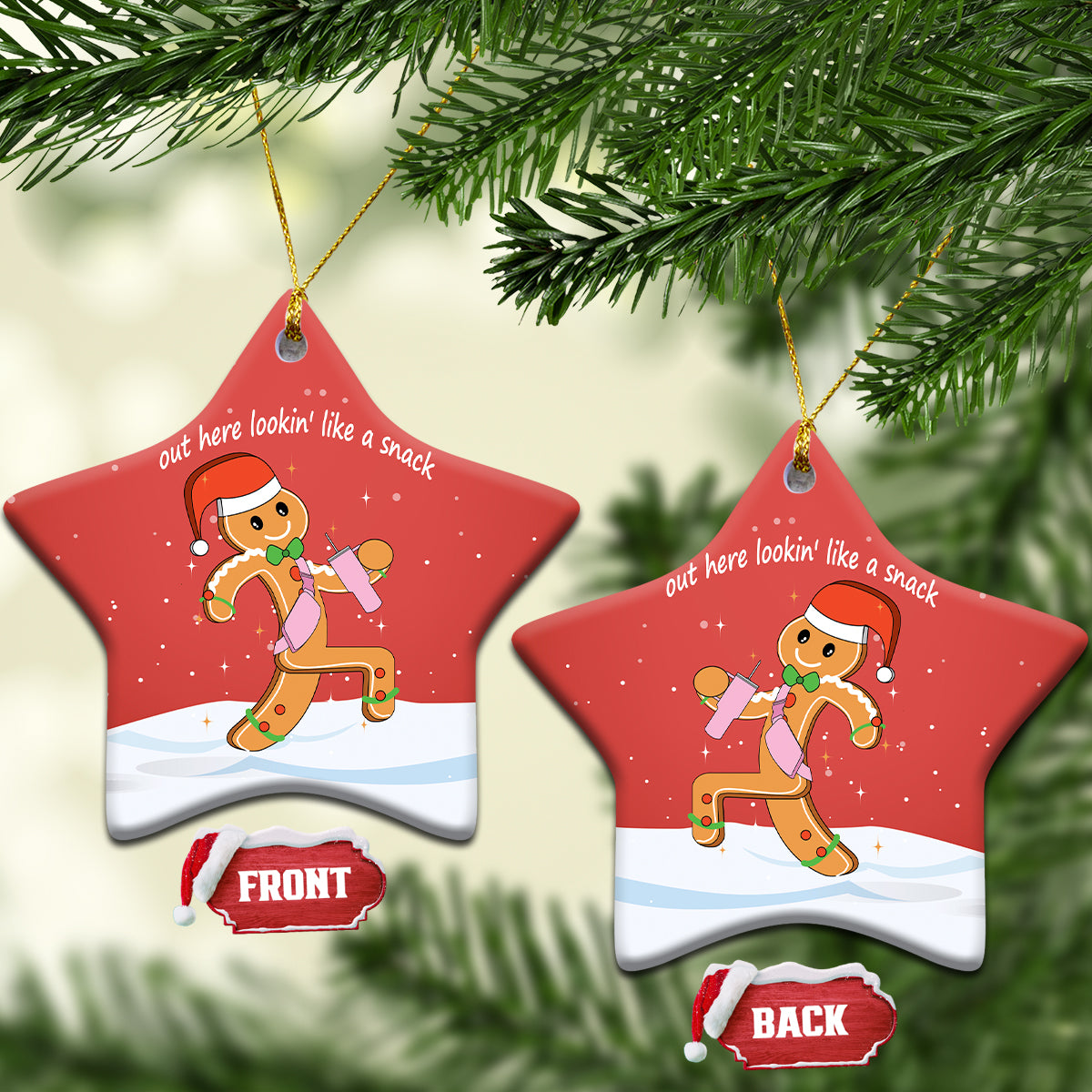 Red star-shaped ceramic ornament with gingerbread runner graphic and gold hanging loop.