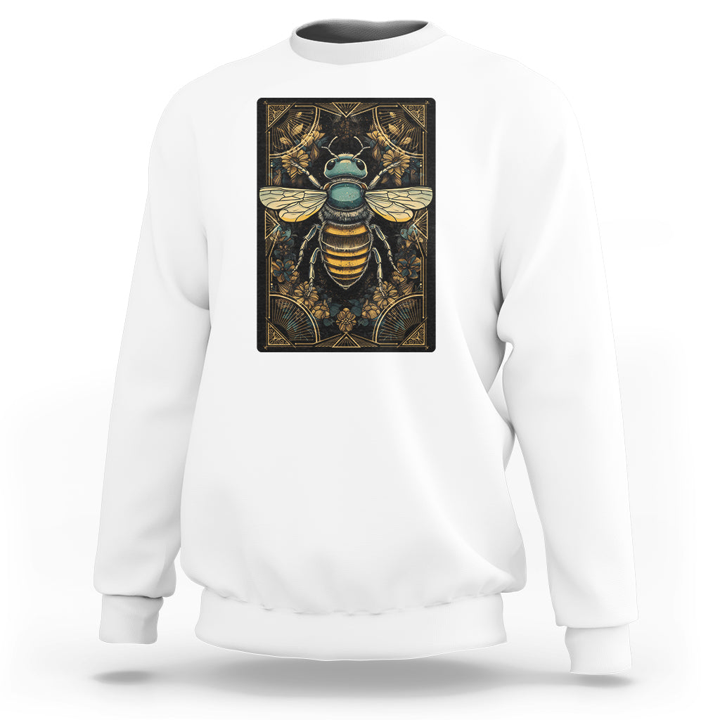 White tarot graphic sweatshirt with bee tarot artwork on front, relaxed fit