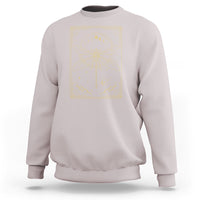Light gray crewneck sweatshirt with gold moon phases dragonfly tarot graphic