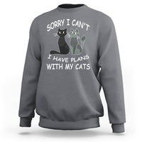 Dark heather gray cat lover sweatshirt with cat graphic and slogan “Sorry I can’t I have plans with my cats”.