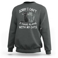 Charcoal gray cat lover sweatshirt with cat graphic and slogan “Sorry I can’t I have plans with my cats”.
