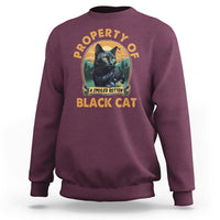Black cat graphic sweatshirt, maroon crewneck with bold front print