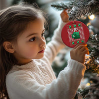 Red circular Christmas ornament with Santa and '#REF!' spreadsheet error pattern on a tree.