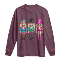 Maroon long-sleeve shirt with three sequin nutcracker character prints across front.