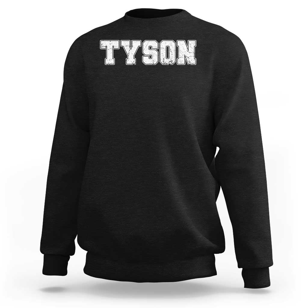 Black crewneck sweatshirt with TYSON front graphic and ribbed cuffs and hem