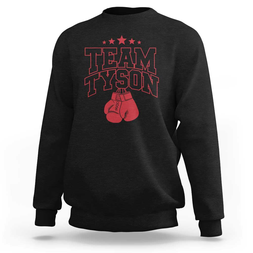 Black crewneck sweatshirt with red "TEAM TYSON" boxing glove graphic