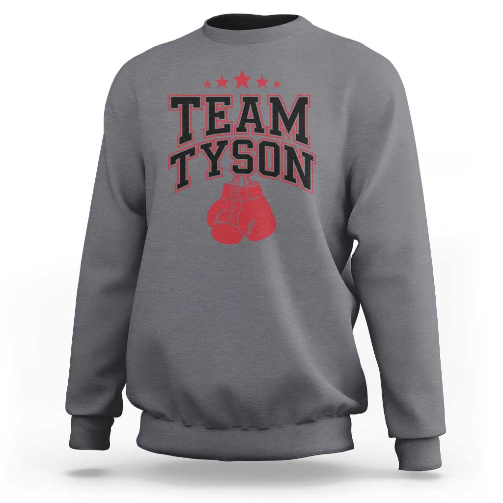 Charcoal crewneck sweatshirt with red "TEAM TYSON" boxing glove graphic