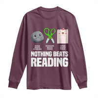 Maroon long sleeve T-shirt with “NOTHING BEATS READING” and rock-paper-scissors print