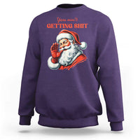 Purple crewneck sweatshirt with Santa graphic and "You ain't getting shit" text