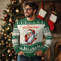Christmas sweater with Santa graphic and 'GETTING SHIT' text, green fair isle pattern