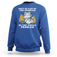 Royal blue crewneck sweatshirt with cat graphic and 'BE THE WHOLE PROBLEM' text