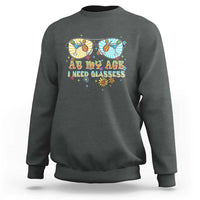 Unisex graphic crewneck sweatshirt in dark heather gray, colorful “Age… need glasses” print.
