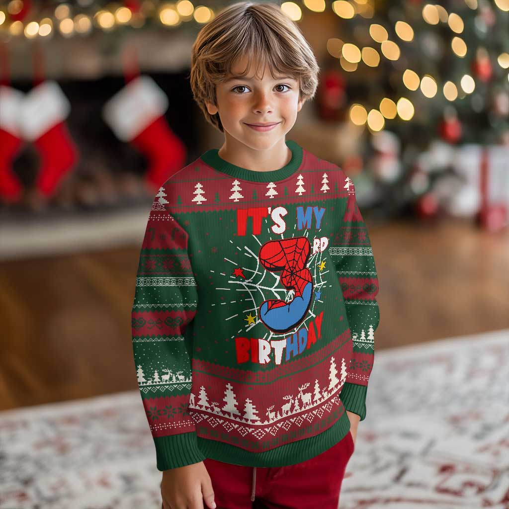 Knitted boys’ birthday sweatshirt in green with red holiday pattern and crew neck
