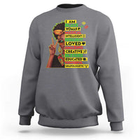 Dark heather gray crewneck sweatshirt with colorful stacked “I AM BLACK” graphic on front