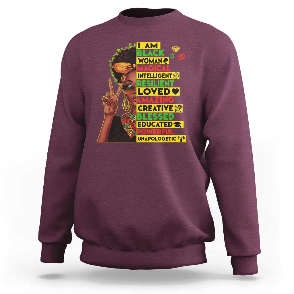 Maroon crewneck sweatshirt with colorful stacked “I AM BLACK” graphic on front