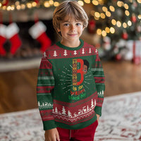 Green boy's knitted sweatshirt with holiday fair isle pattern and face graphic B