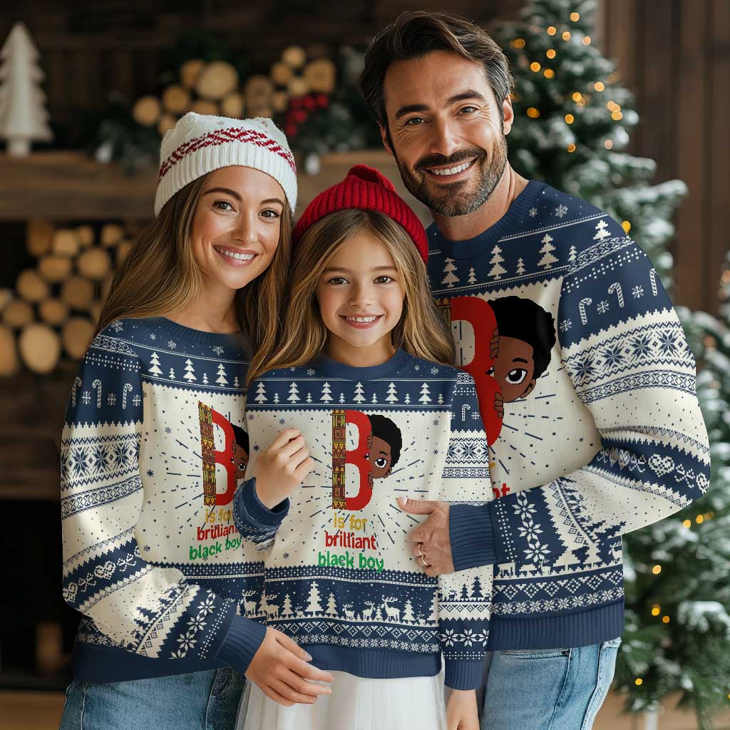 Navy and white boy's knitted sweatshirt with holiday fair isle pattern and face graphic