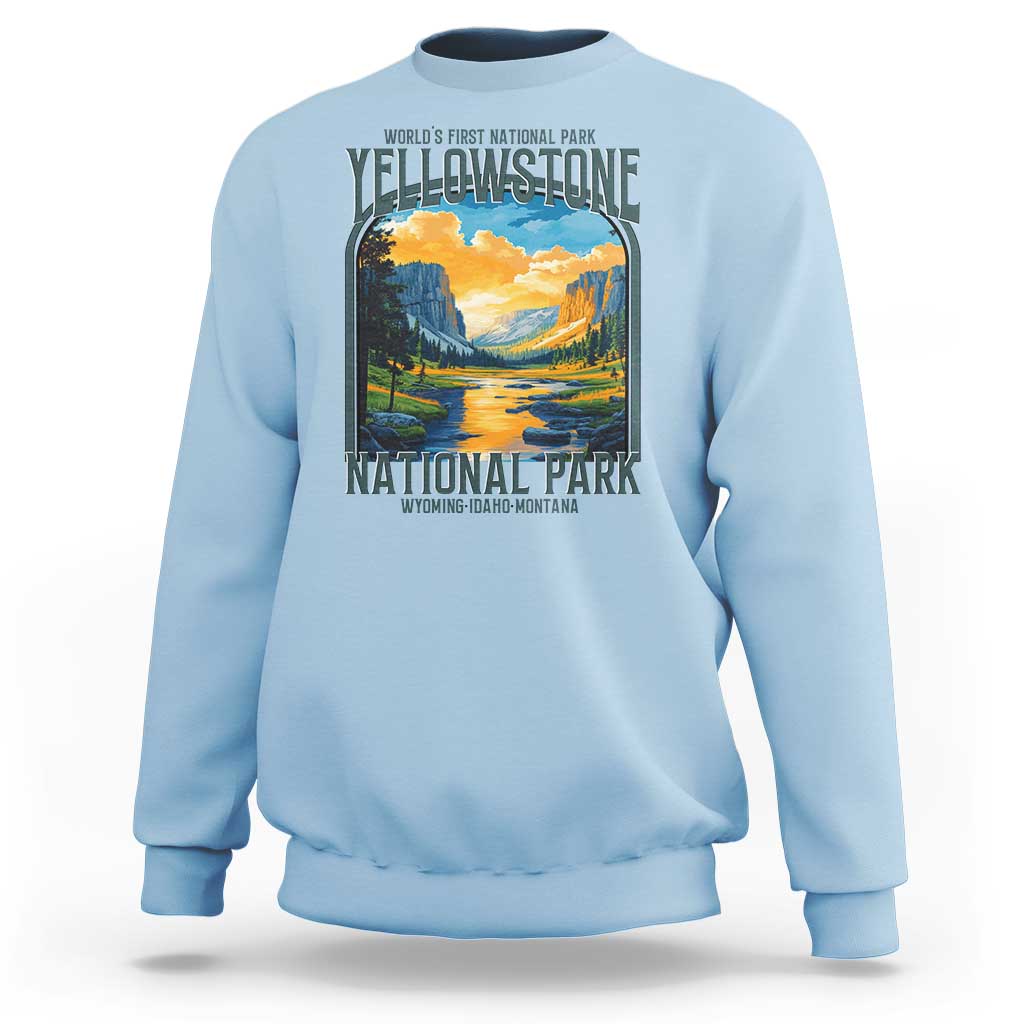 Light blue crewneck sweatshirt with Yellowstone National Park retro landscape graphic