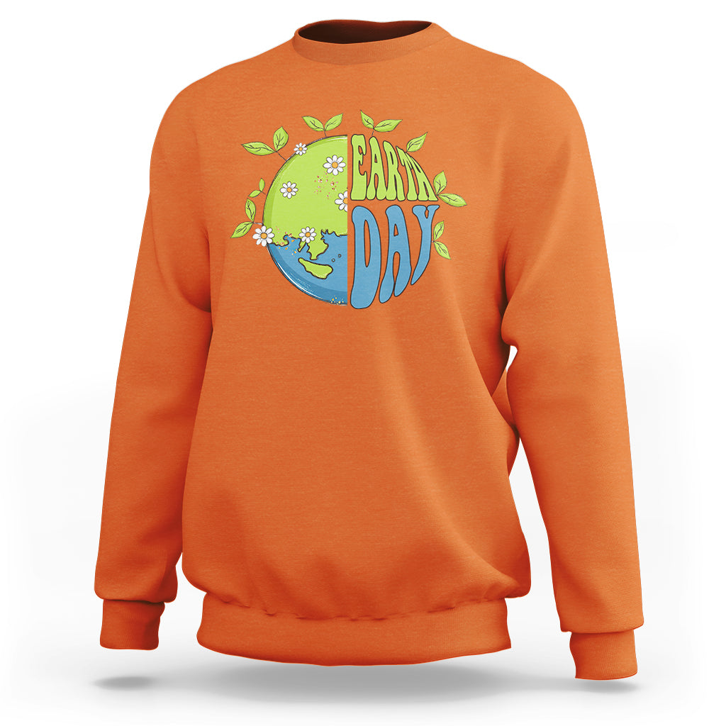 Orange sweatshirt with Earth Day “Earth Day” graphic on the chest