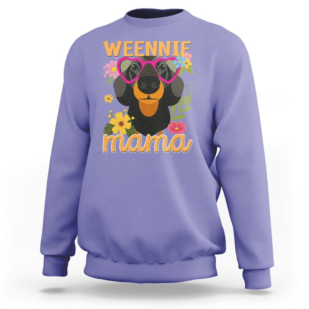 Lavender sweatshirt with dachshund graphic and “Weennie mama” text on front