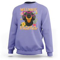Lavender sweatshirt with dachshund graphic and “Weennie mama” text on front