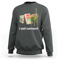 Charcoal crewneck sweatshirt with 'i eat cement' cat graphic on front