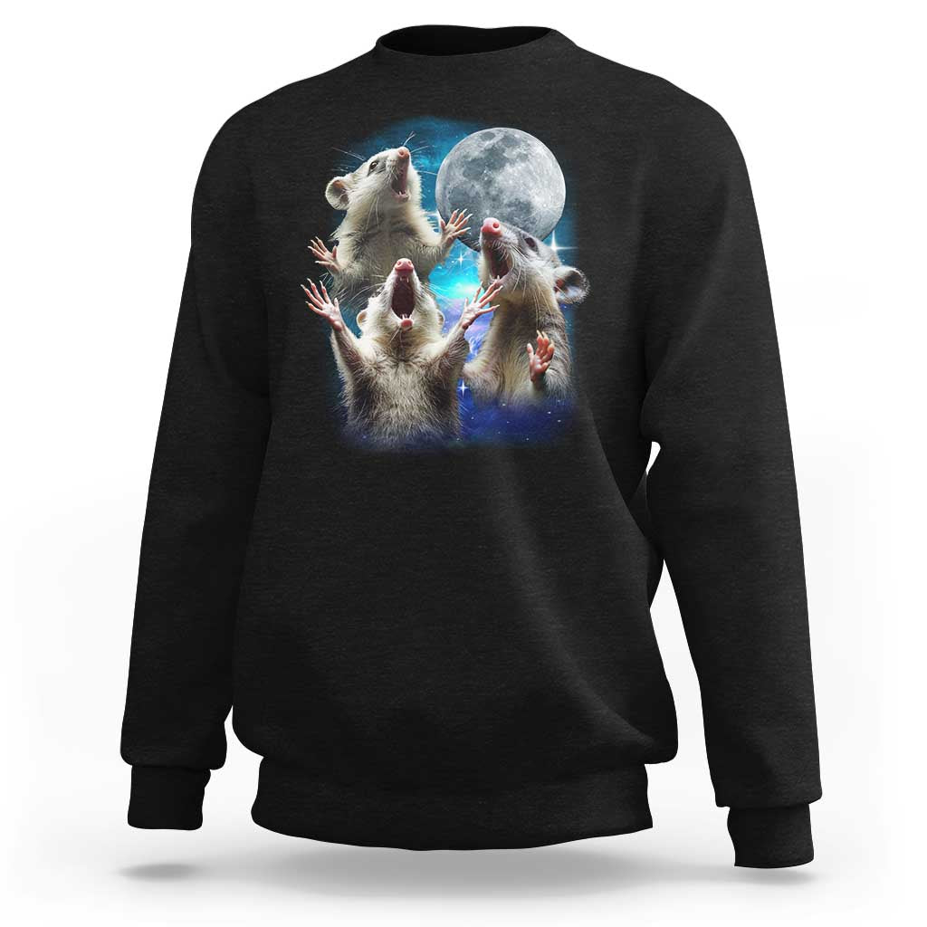 Black crewneck sweatshirt with three opossums under-moon graphic.
