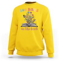 Daisy yellow crewneck sweatshirt with “100 Days” floral open-book “in the book” graphic